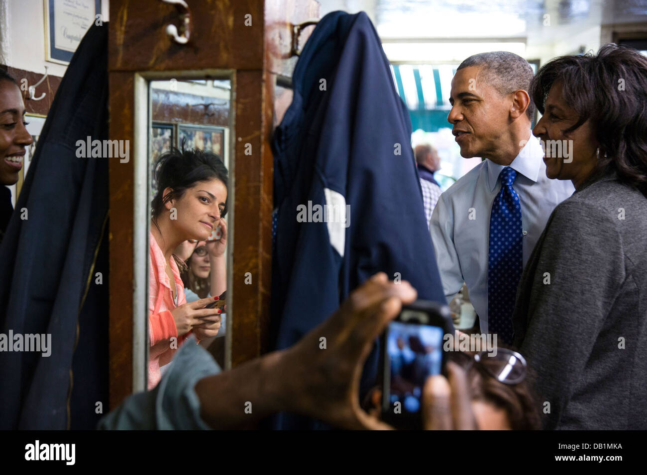 US President Barack Obama greets patrons during an unannounced stop at Charlie's Sandwich Shoppe June 12, 2013 in Boston, MA. Stock Photo