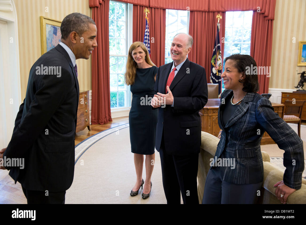 US President Barack Obama talks with, from left: Samantha Power, former Senior Director for Multilateral Affairs and Human Rights; National Security Advisor Tom Donilon; and Susan Rice, US Permanent Representative to the United Nations in the Oval Office June 5, 2013 in Washington, DC. Stock Photo