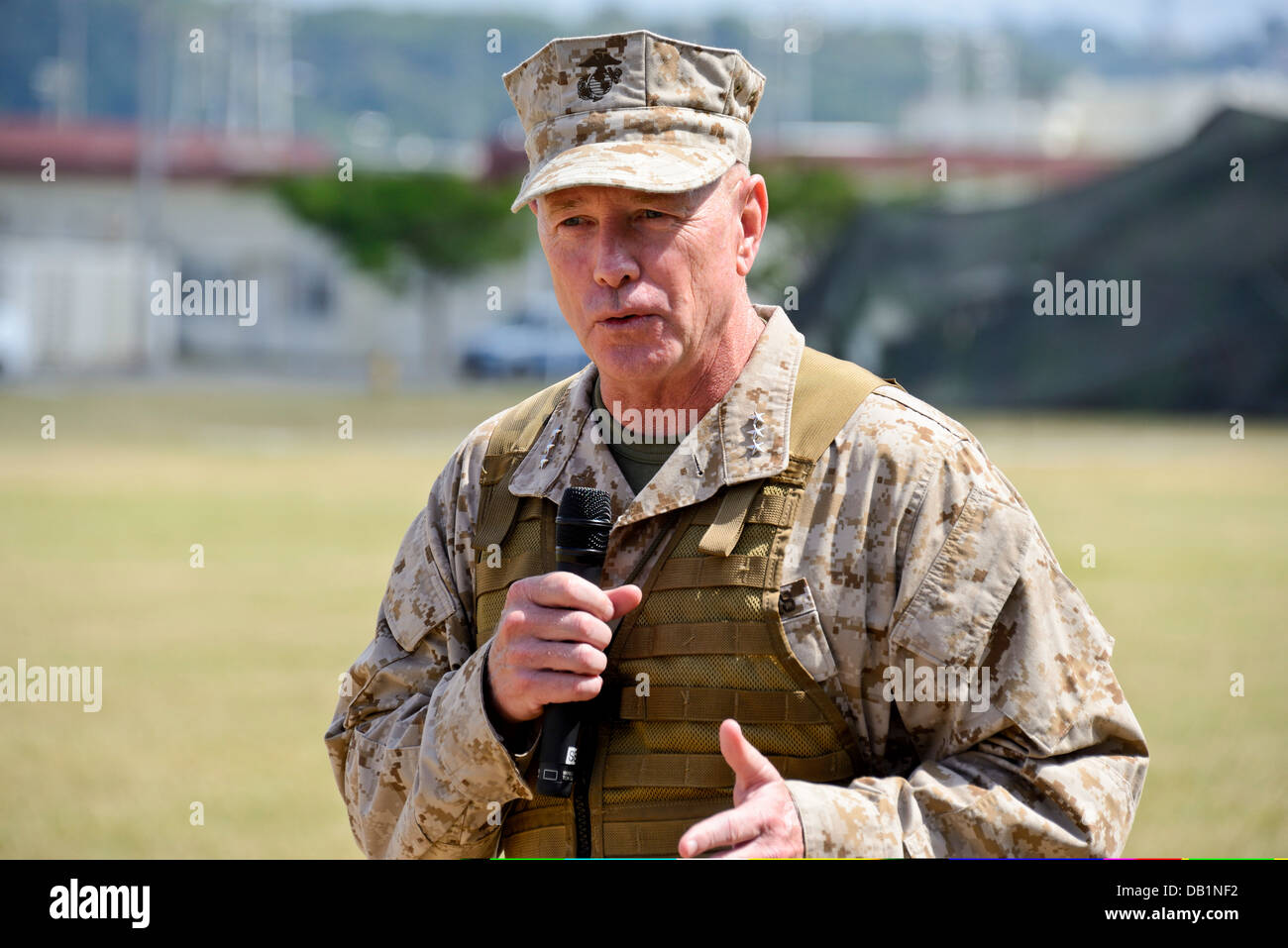 Lt. Gen. Kenneth J. Glueck Jr. addresses the audience following the III Marine Expeditionary Force change of command ceremony Ju Stock Photo