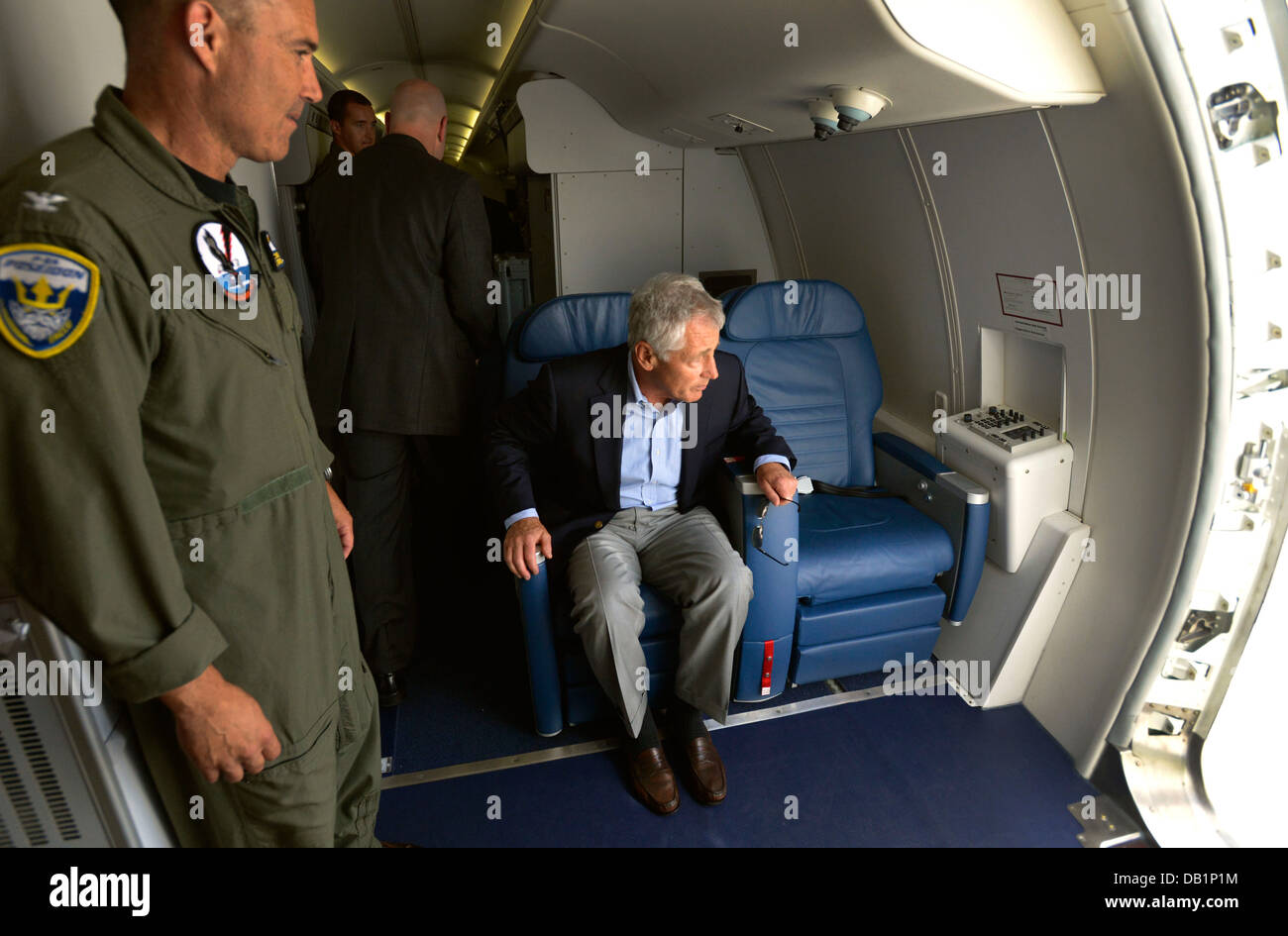 Secretary of Defense Chuck Hagel takes his seat aboard a U.S. Navy P-8 Poseidon aircraft assigned to Patrol Squadron (VP) 30 before departing Naval Air Station Jacksonville, Fla., July 16, 2013. Hagel was on a three-day trip to visit several installations Stock Photo