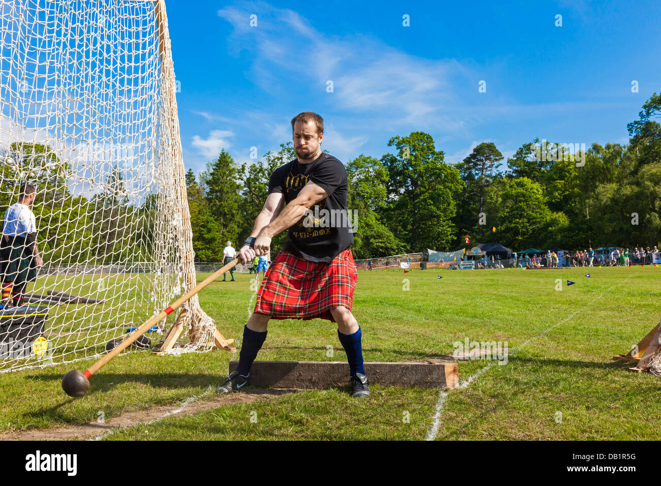 Highland games scotland hammer thrower hires stock photography and