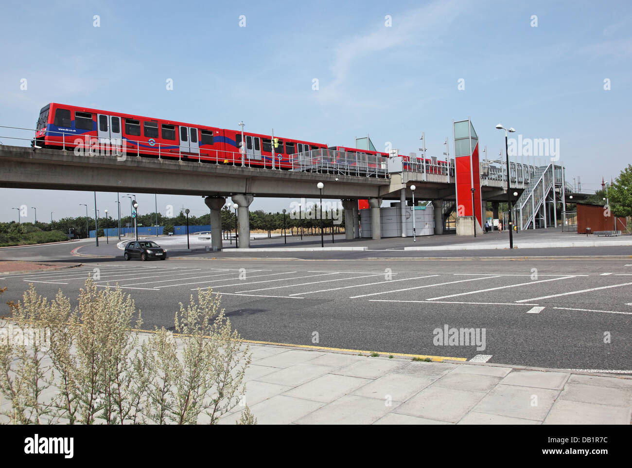 A London Docklands Light Railway train departs from Gallions Reach station in Beckton, east London, UK Stock Photo
