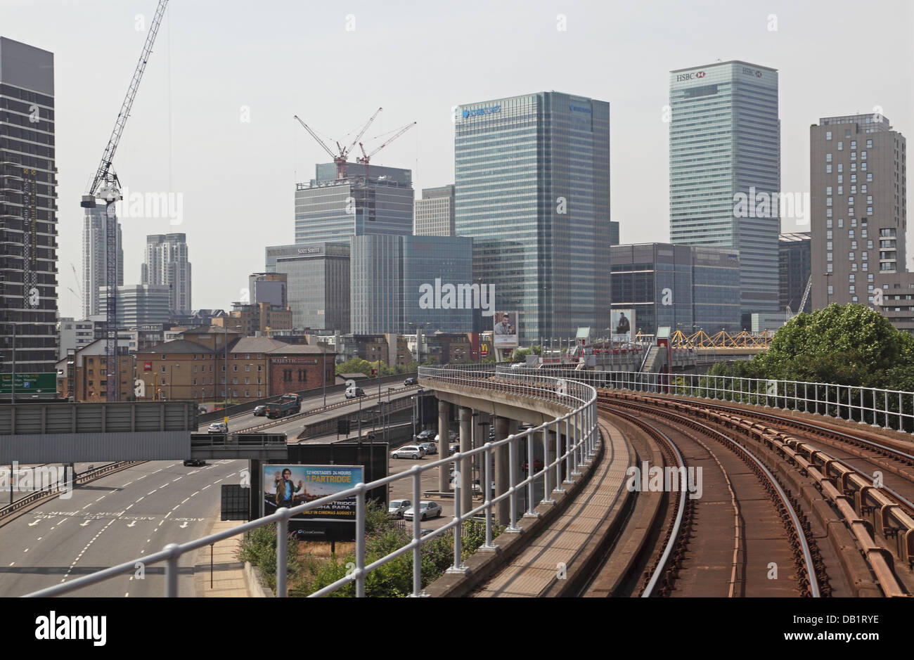 Road and rail links to London's Canary Wharf business district Stock Photo