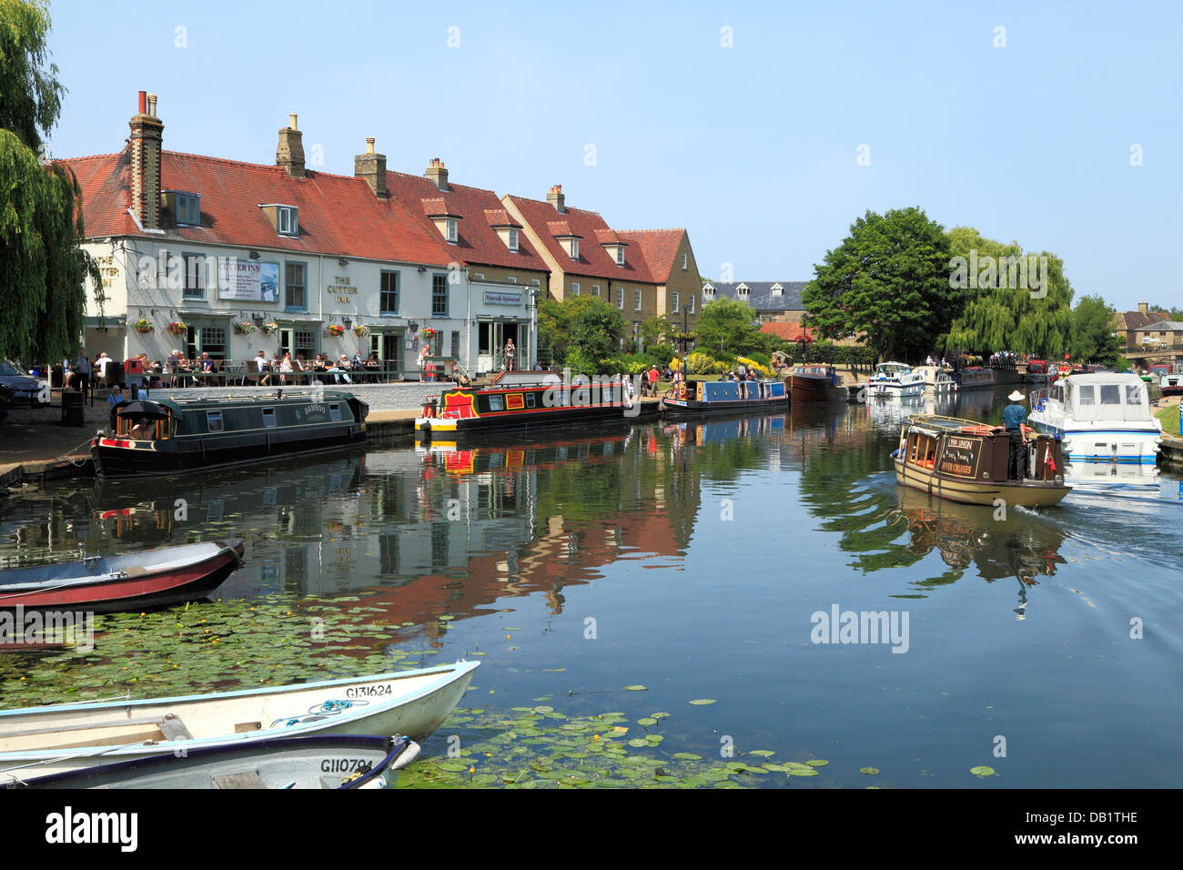 Ely, River Ouse, Cutter Inn, Barges boats English rivers riverside pubs inns pub, Cambridgeshire England UK Stock Photo