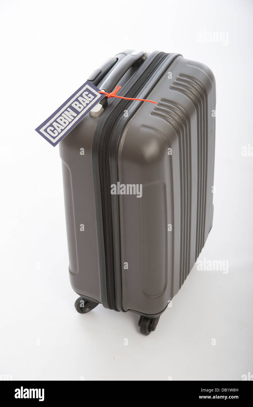Roll along cabin bag regulations size for use on aircraft Stock Photo