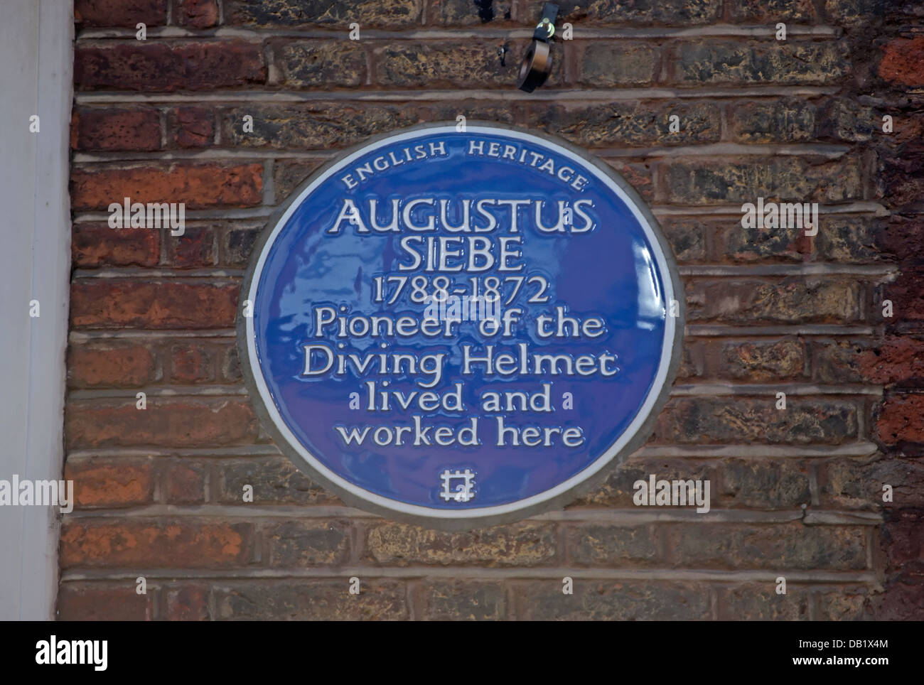 english heritage blue plaque marking the home and workplace of augustus siebe, pioneer of the diving helment Stock Photo