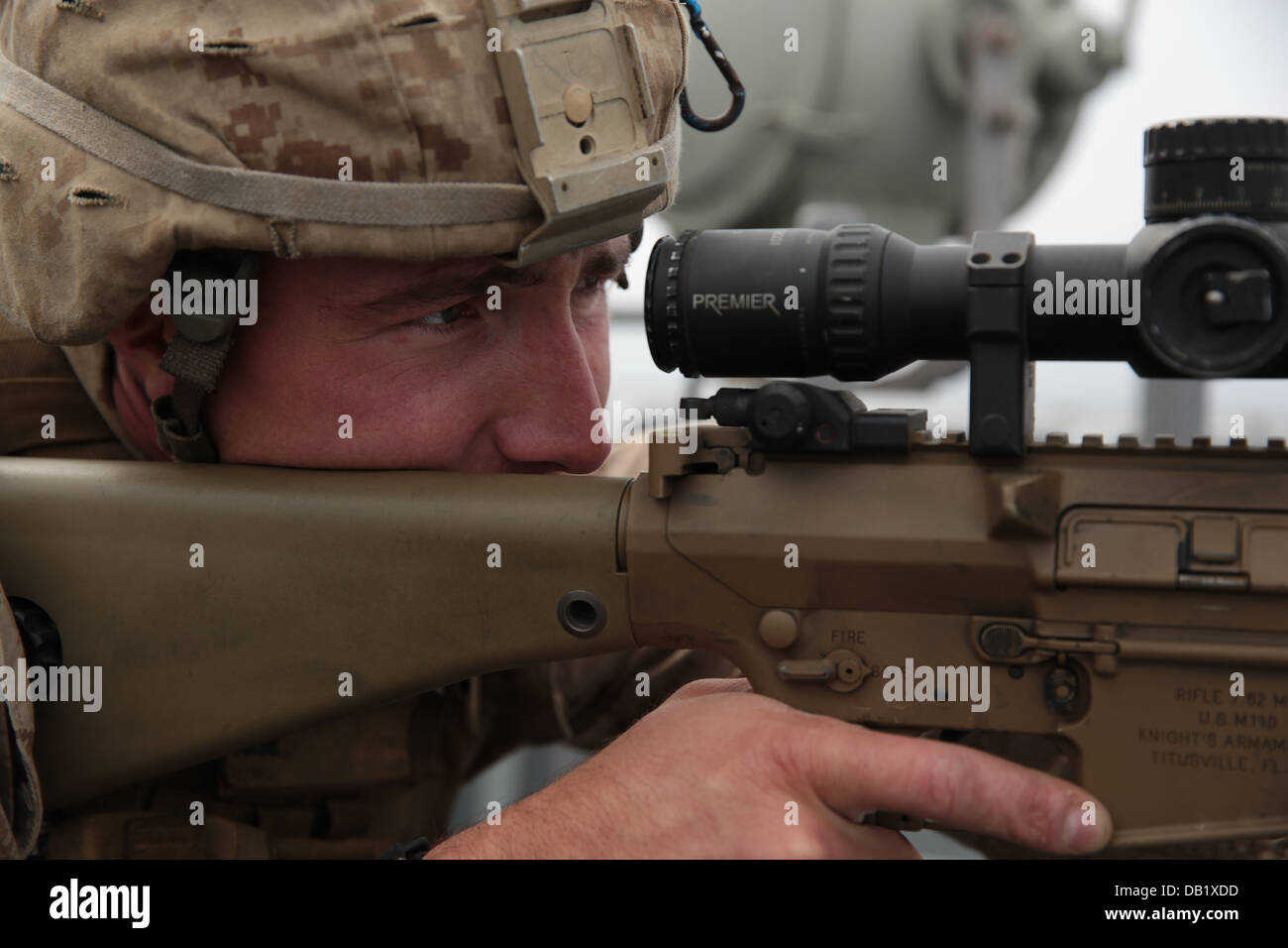 Cpl. Matthew D. Wagoner, a scout sniper with Scout Sniper Platoon, Weapons Company, Battalion Landing Team 1/4, 13th Marine Expe Stock Photo