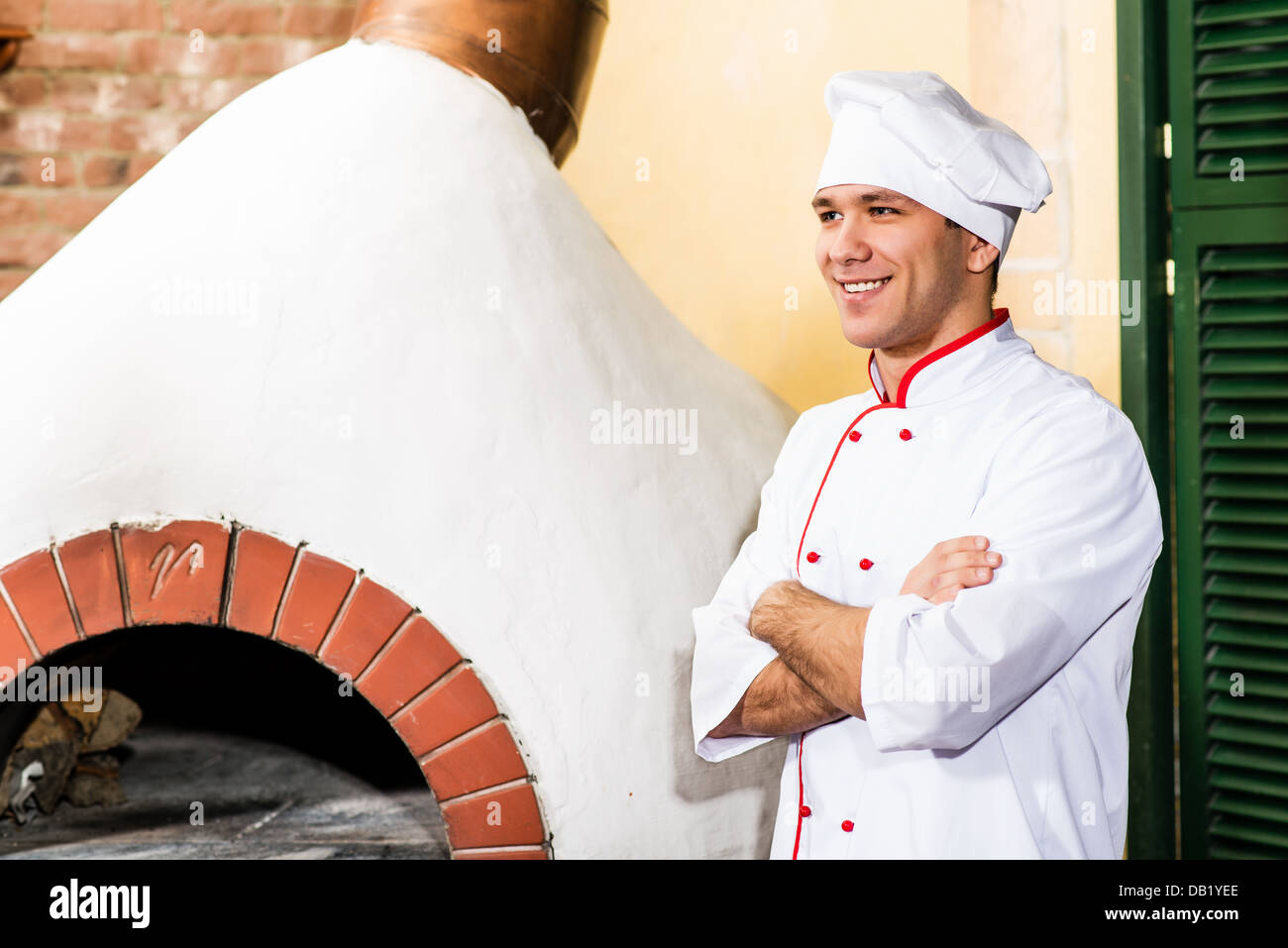 portrait of a cook in the kitchen Stock Photo - Alamy
