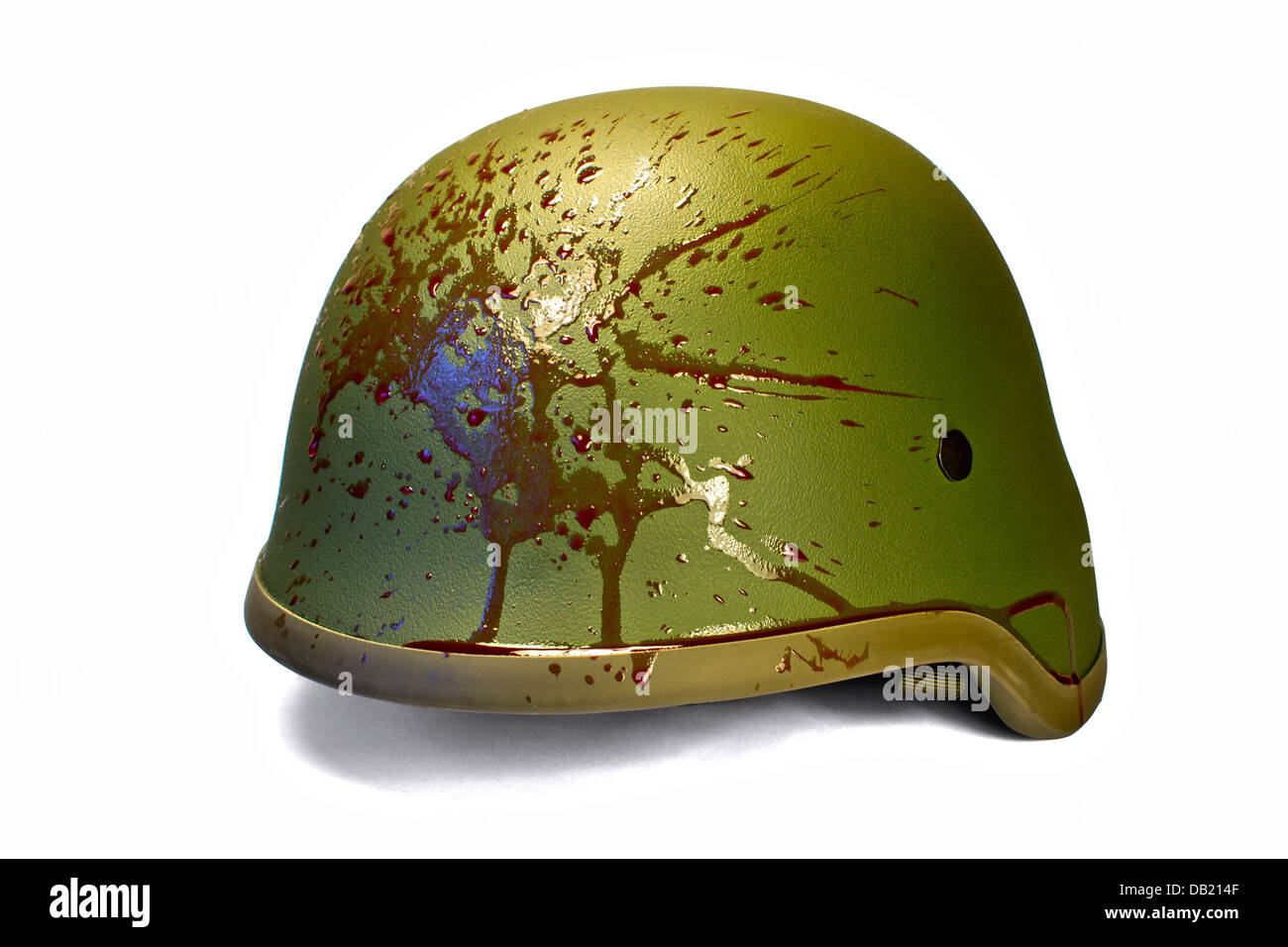 Military or police helmet with blood splattered, isolated on white, clipping path (without shadow). Stock Photo