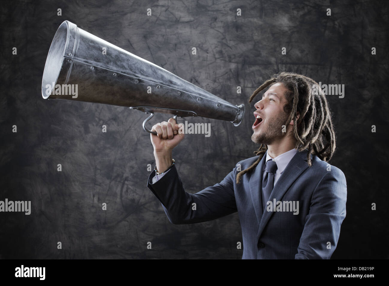 screaming into megaphone Stock Photo Alamy