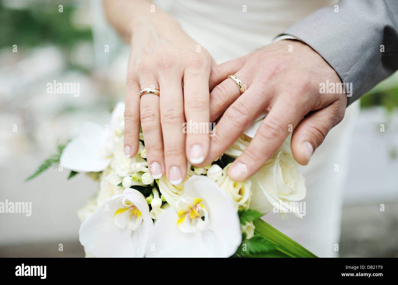 The couple holding hands together. They had a wedding rings wear their  fingers. Stock Photo | Adobe Stock | Couple holding hands, Wedding rings,  Hands together