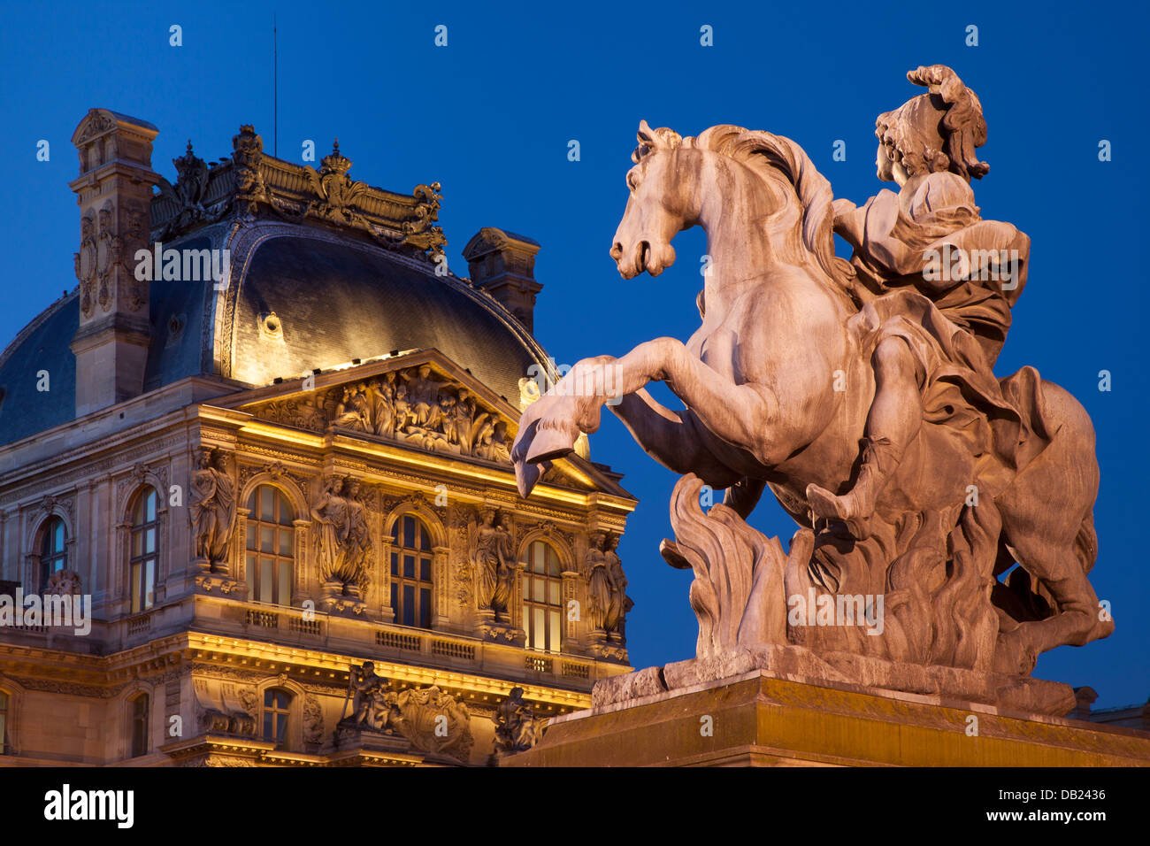 Equestrian statue of Louis XVI at entrance to Musee du Louvre, Paris France Stock Photo