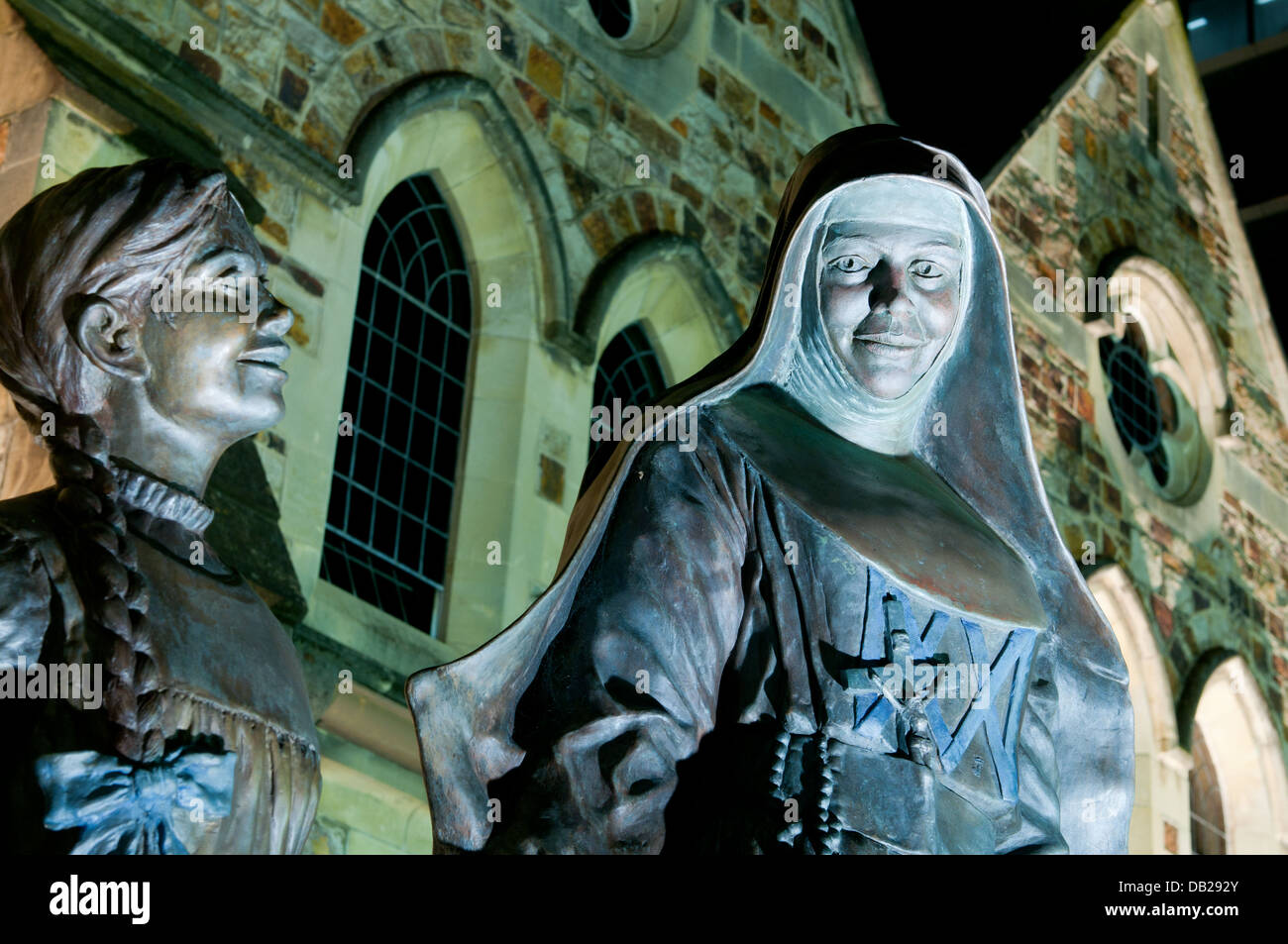 Mary Mackillop statue outside of St Franics Xavier Cathderal in Adelaide at night Stock Photo
