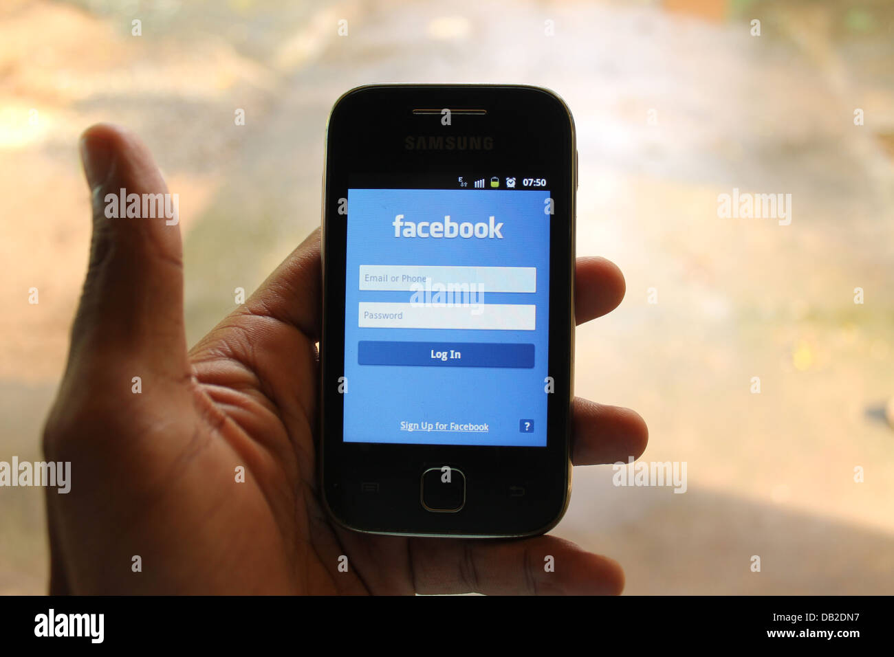 Facebook login page on a smartphone Stock Photo Alamy