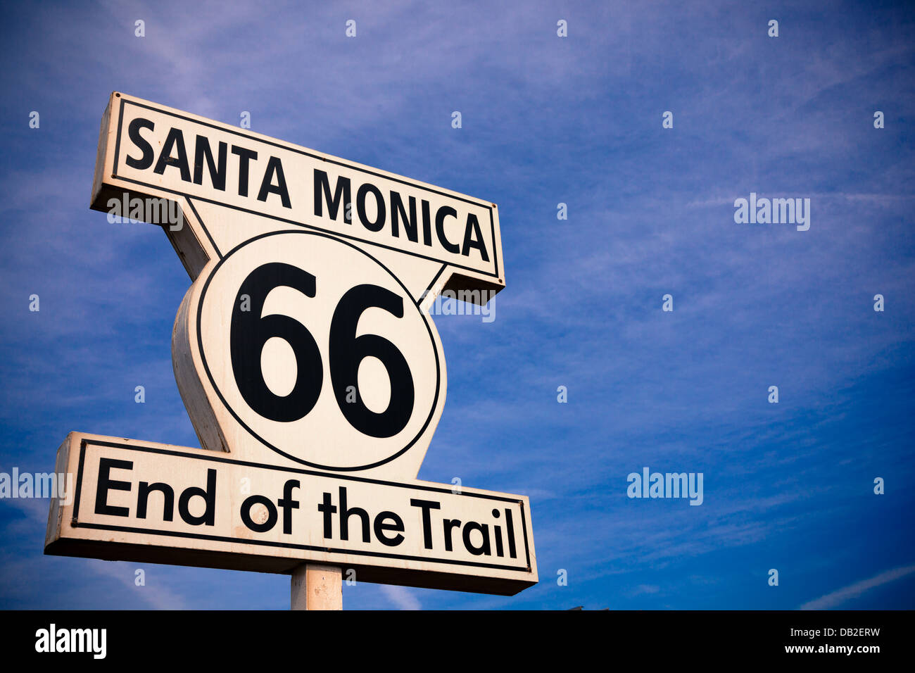 The Historic Route 66 Santa Monica Sign with a sky blue background Stock Photo