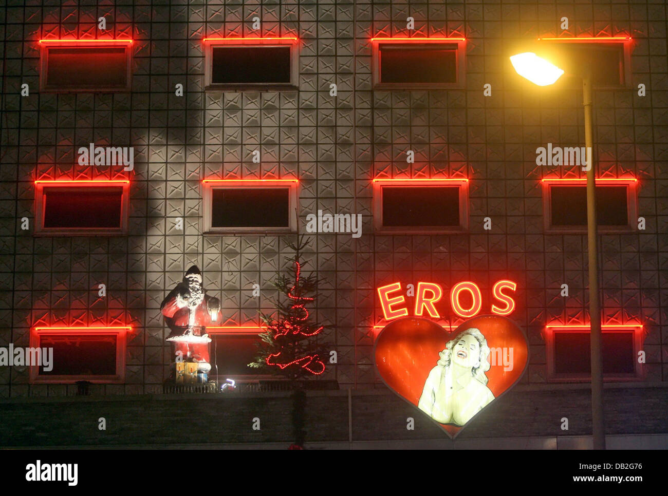 A red neon sign reads 