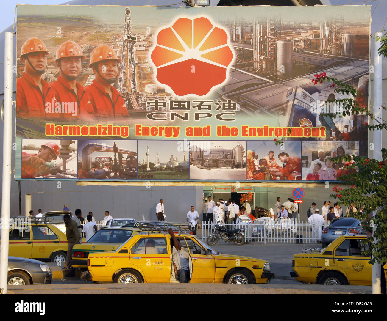 A giant advertisement poster is for the Chinese National Petroleum Corporation (CNPC) is