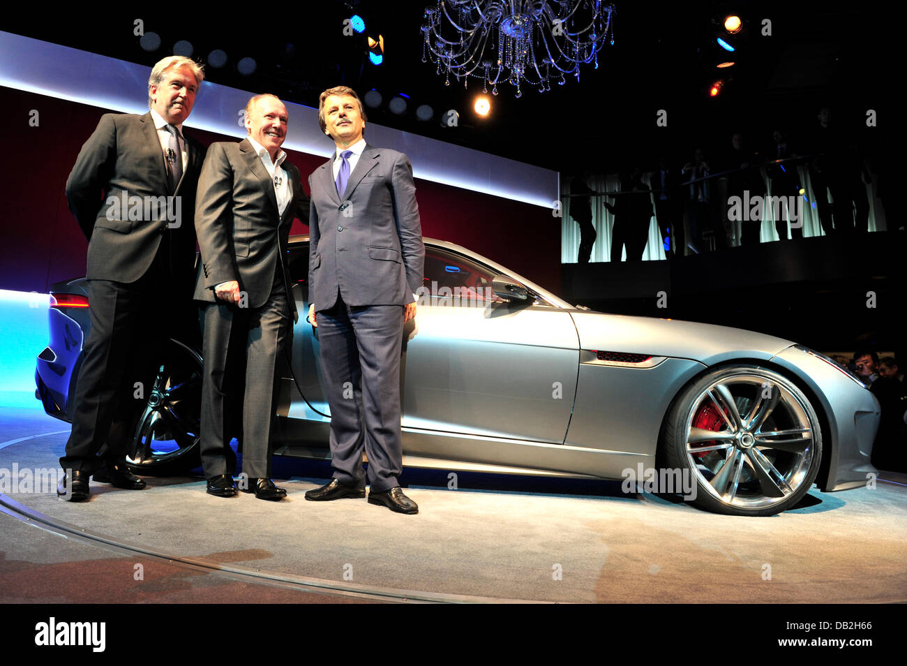 Adrian Hallmark, Jaguar Brand Director, Ian Callum, head designer for Jaguar, and Ralf Speth, CEO of Jaguar and Land Rover stand next to the concept sports car Jaguar C-X16 during its presentation at Palais Thurn und Taxis at the International Motor Show IAA in Frankfurt Main, Germany, 12 September 2011. From 15 to 25 September 2011 exhibitors from all over the world will present n Stock Photo