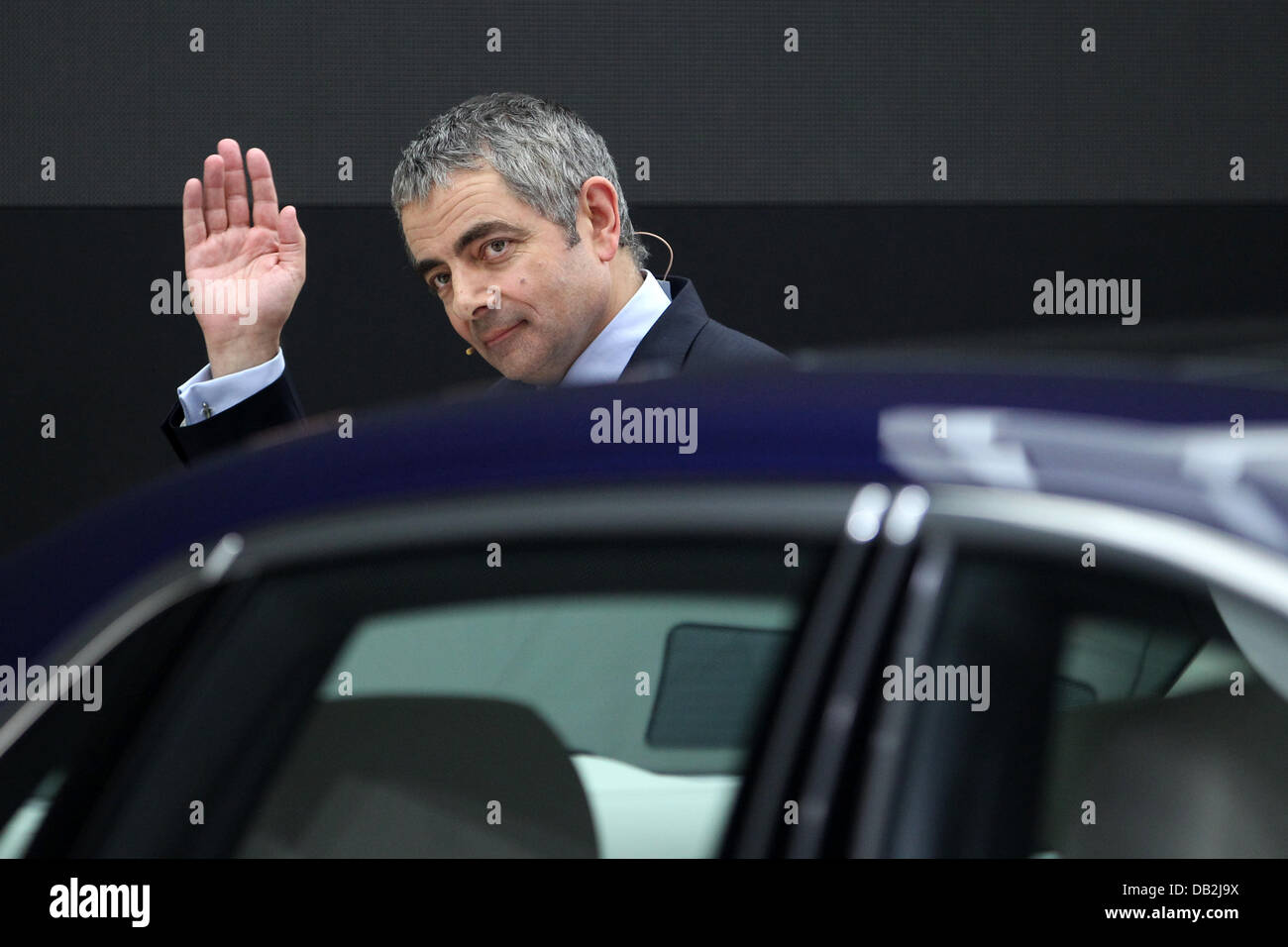 Comedian Rowan Atkinson (Mr. Bean) presents the new Rolls-Royce 'Ghost' at the International Motor Show IAA in Frankfurt Main, Germany, 13 September 2011. From 15 to 25 September 2011 exhibitors from all over the world will present new trends of the automotive industry, headed by electronic mobility and hybrid vehicles. Photo: Fredrik von Erichsen Stock Photo