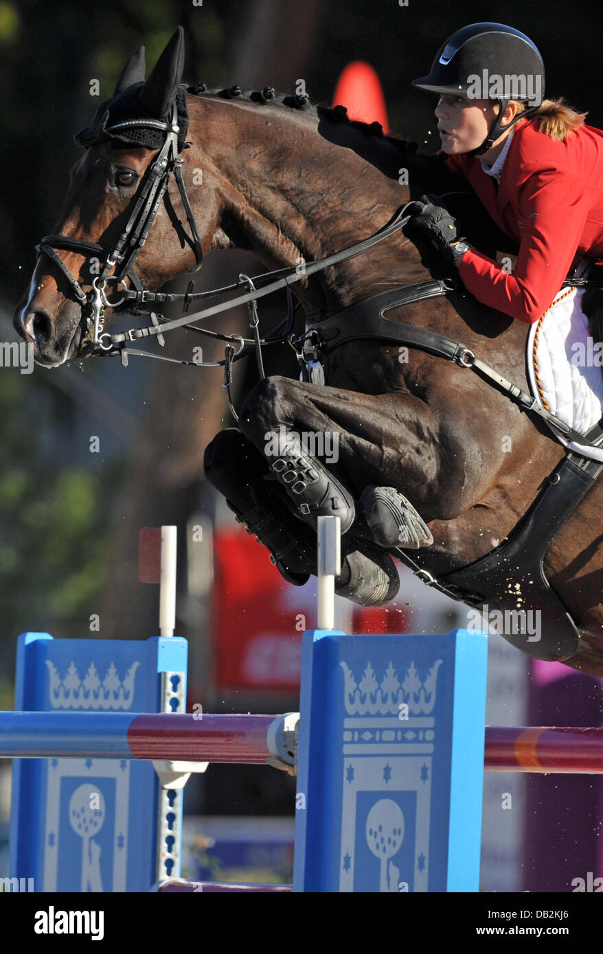German show jumper JanneFriederike Meyer jumps over an obstacle on her