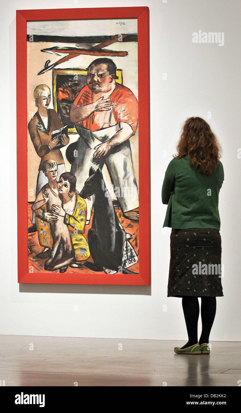 A young woman looks at "Family Portrait Heinrich George" (1935) by Max  Beckmann at an exhibition at the Museum of Fine Arts in Leipzig, Germany,  15 September 2011. Over 200 images by