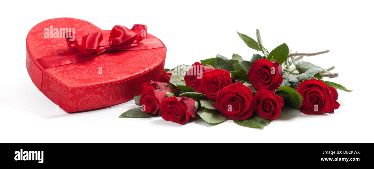 A bouquet of red roses and a red heart for Valentine's Day Stock Photo ...