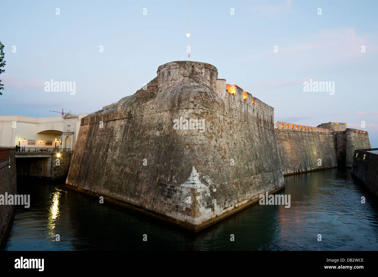 Wall and moat in the isthmus of Spanish enclave of Ceuta . Spain. Stock Photo