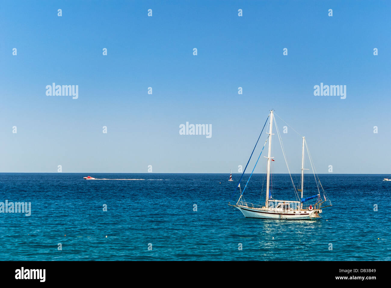 Sailing yacht on the calm sea Stock Photo - Alamy