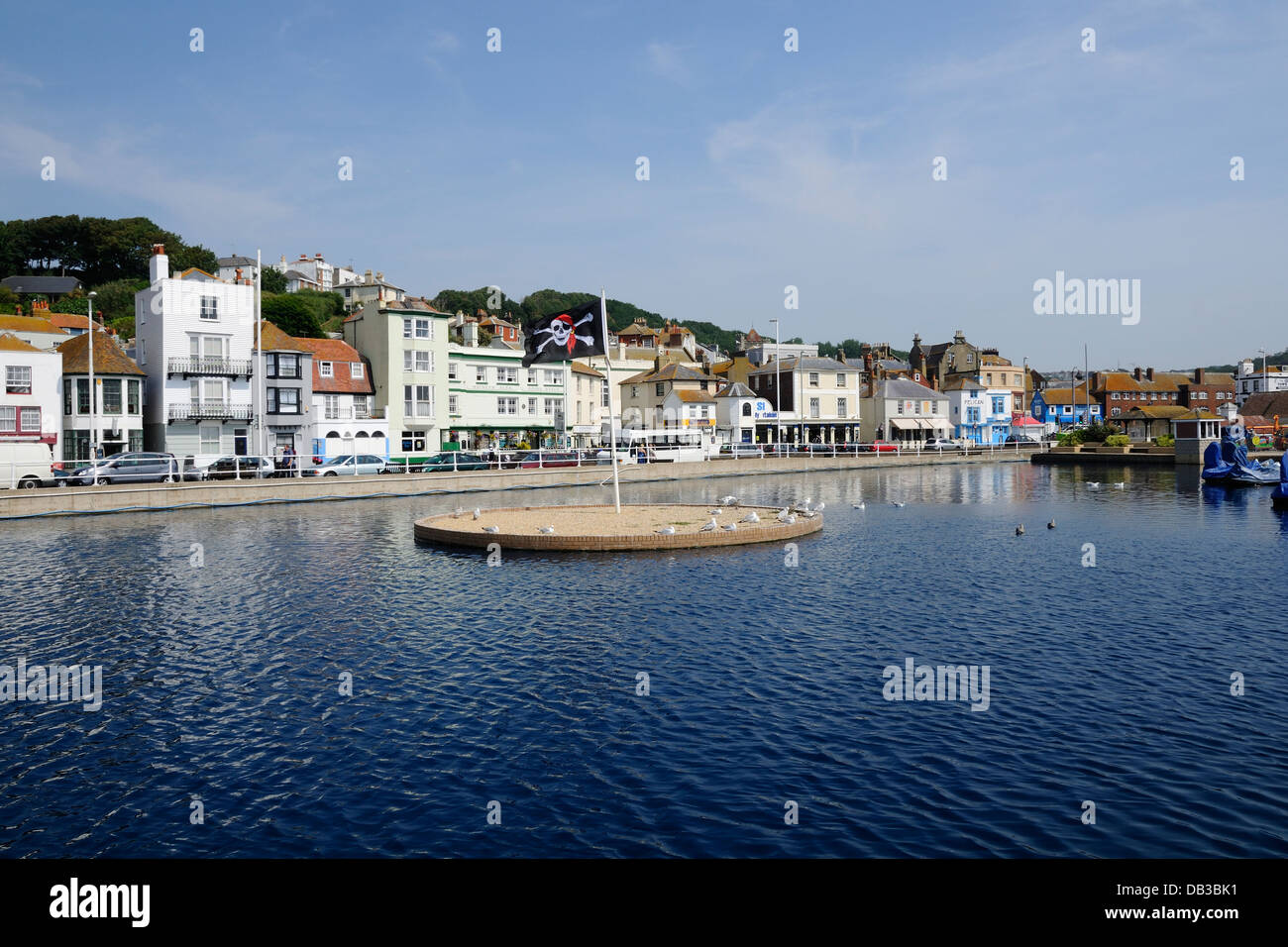 The boating lake and buildings on Hastings Old Town seafront, East Sussex, South East England Stock Photo