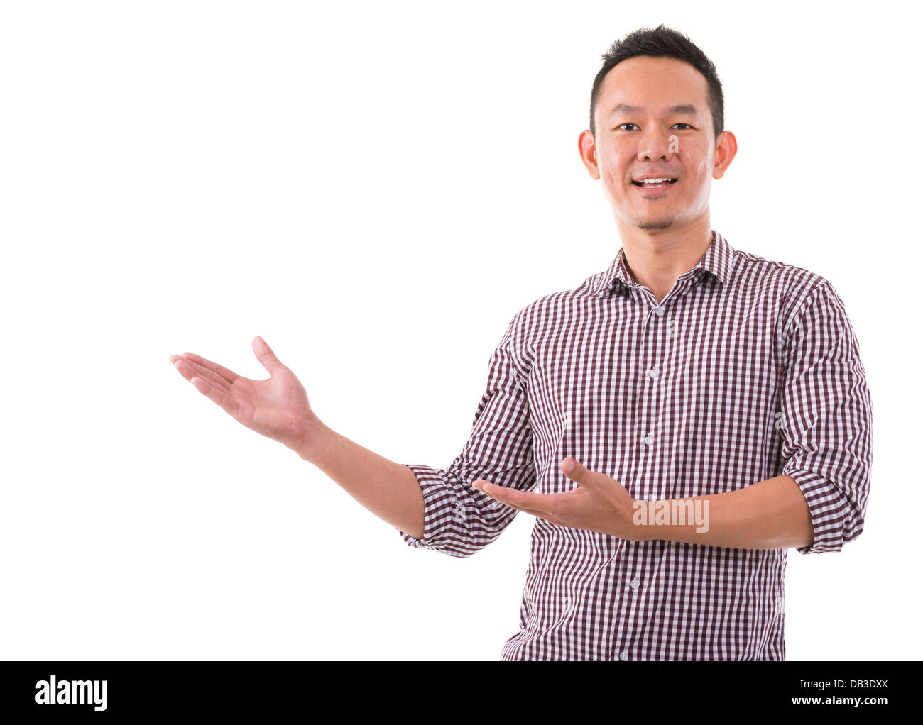 Portrait of a happy business man of Asian showing something isolated on ...