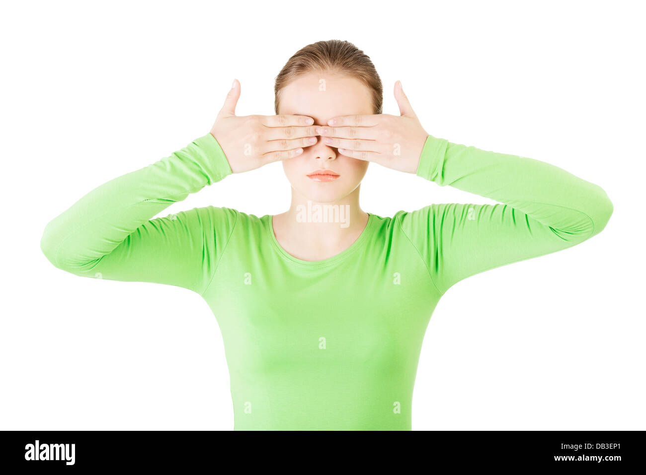 Young teen woman covering her face with hands, isolated on white Stock ...