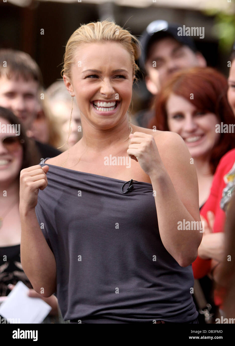 Hayden filming an interview for the entertainment television