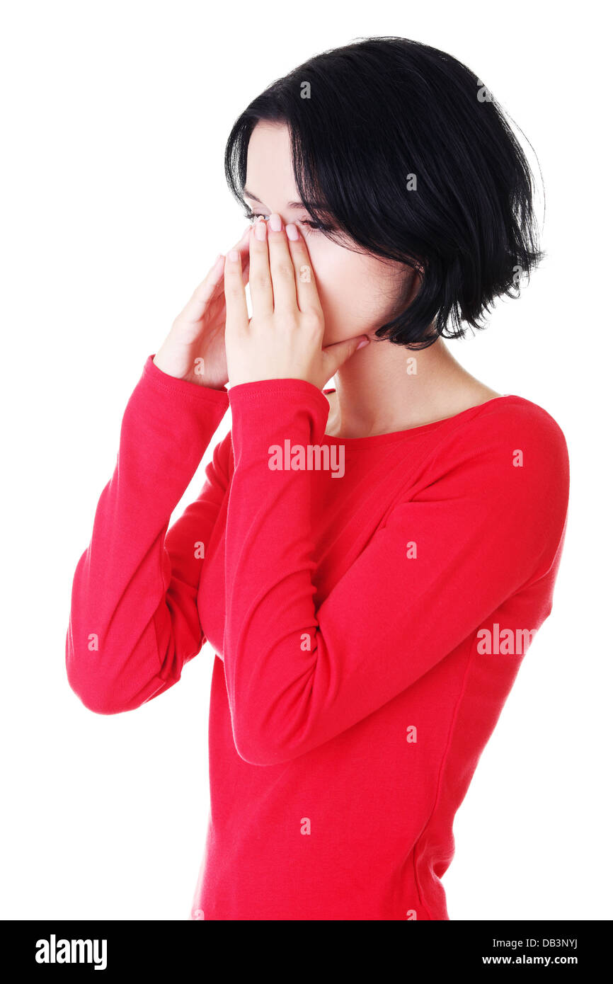 Young woman with sinus pressure pain , isolated on white Stock Photo