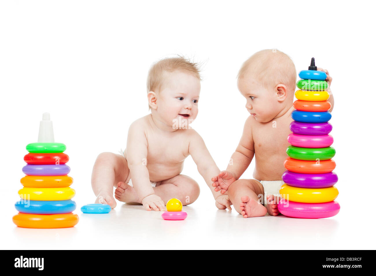 babies play with color developmental toys Stock Photo