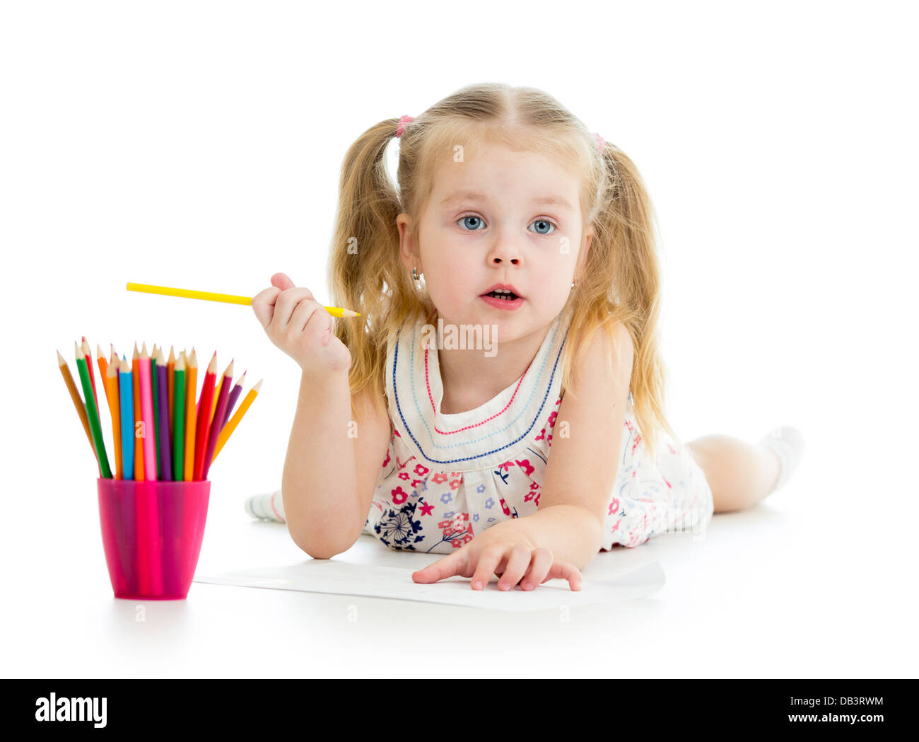 Cute girl drawing a picture with color pencils Stock Photo