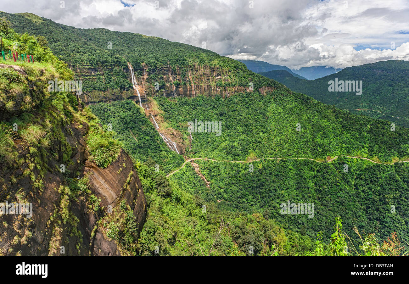 View across the beautiful Khasi Hills, a waterfall, and the main road to Cherrapunjee from Shillong, Meghalaya, India. Stock Photo