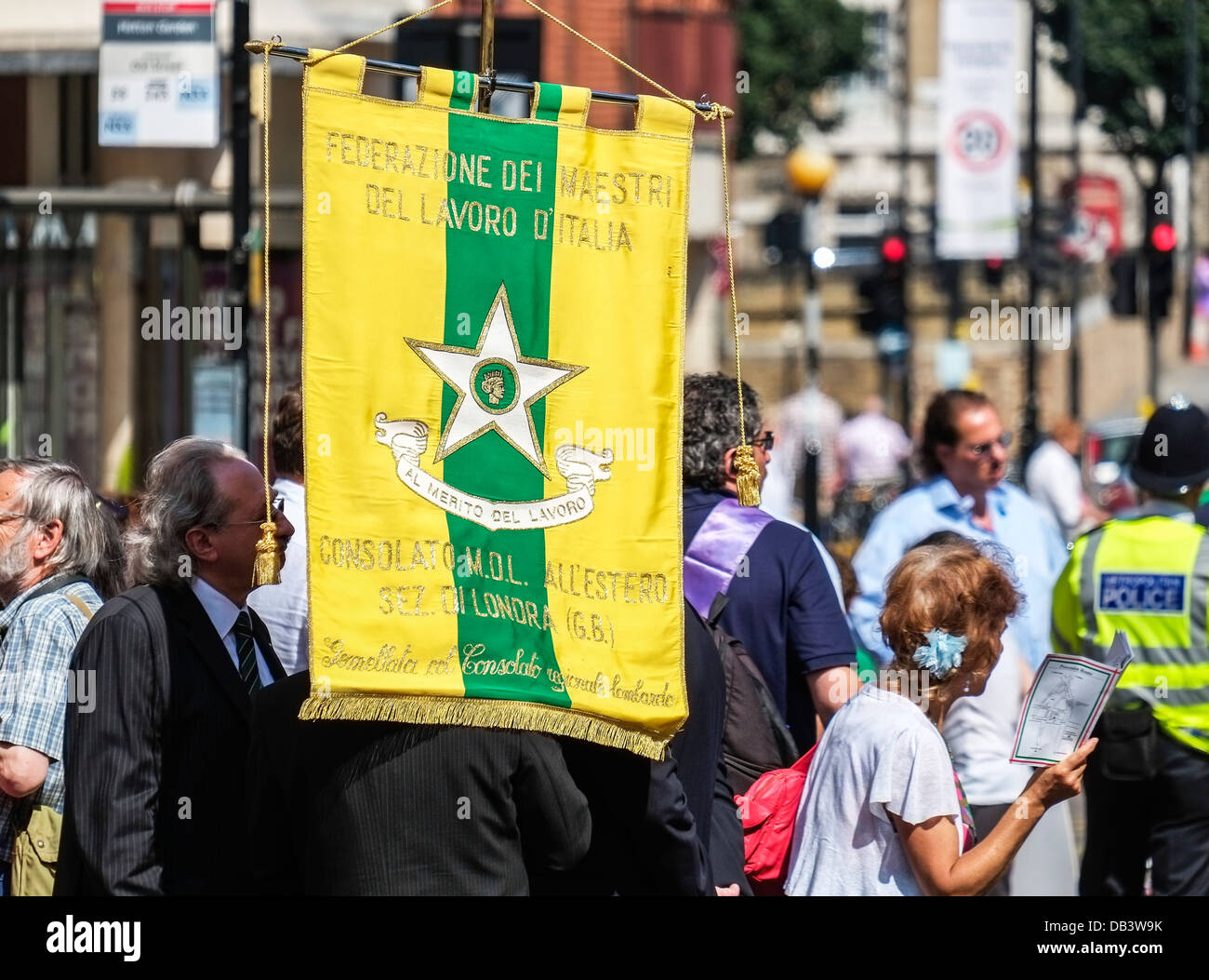 A banner being paraded at the start of the Sagra Procession in Honour of Our Lady of Mount Carmel. Stock Photo