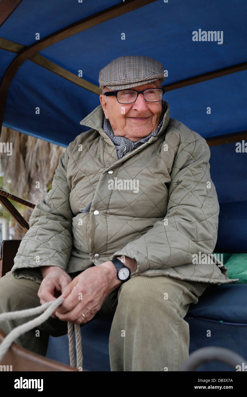 Spanish coachman in charge of steering horsedrawn carriages on the