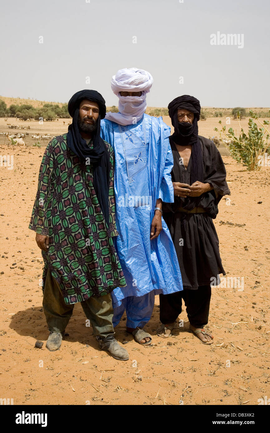 Three Malian Tuareg village men from north east Mali in traditional ethnic clothes,  West Africa Stock Photo