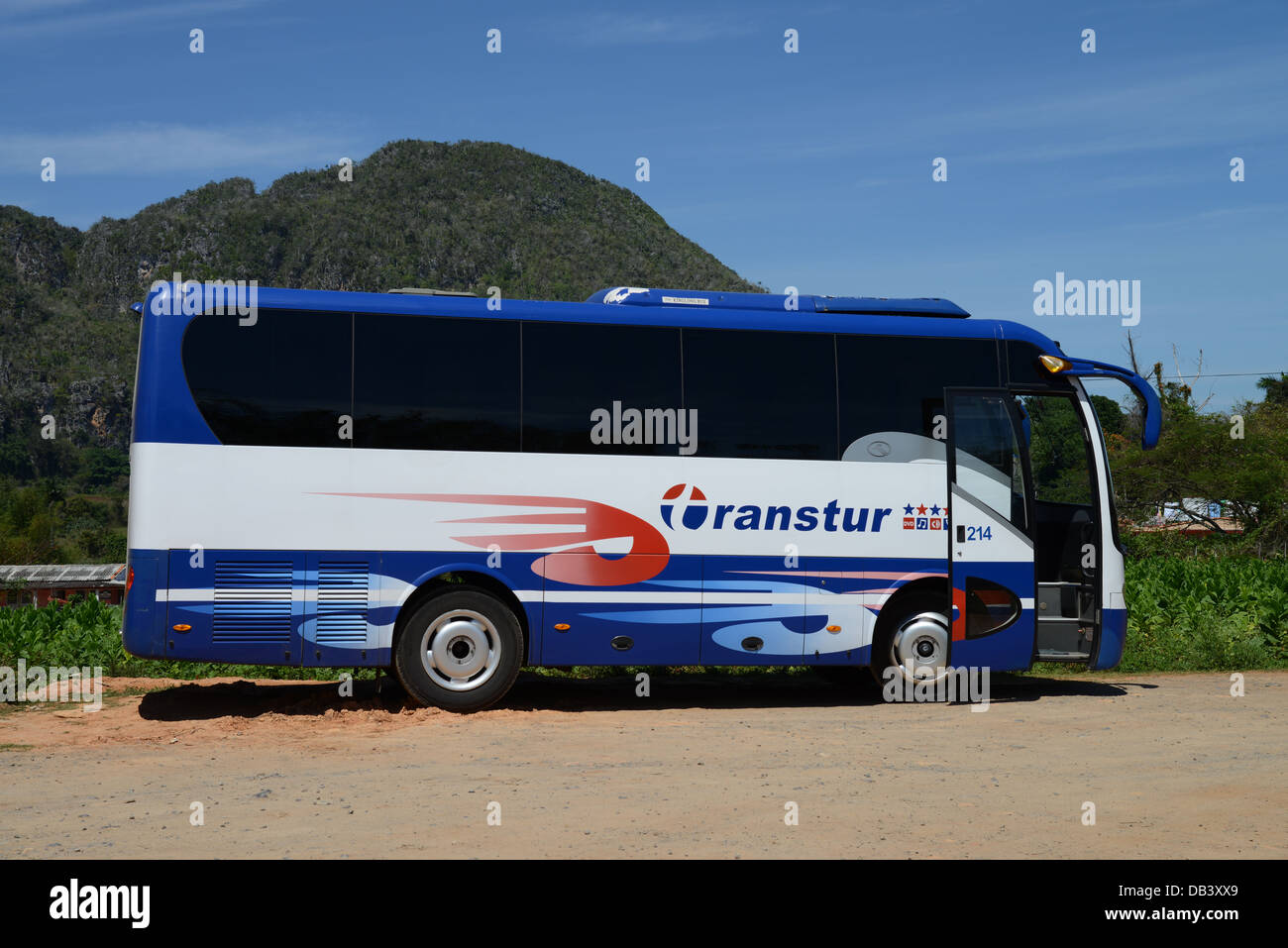 Chinese-made tourist bus belonging to the Cuban government-owned tour company Transtur, in Vinales, Cuba Stock Photo