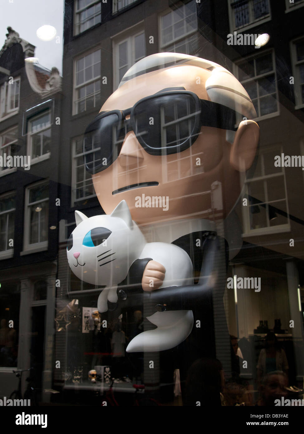 Cartoon character of Karl Lagerfeld in his shop in the city of Amsterdam, the Netherlands Stock Photo