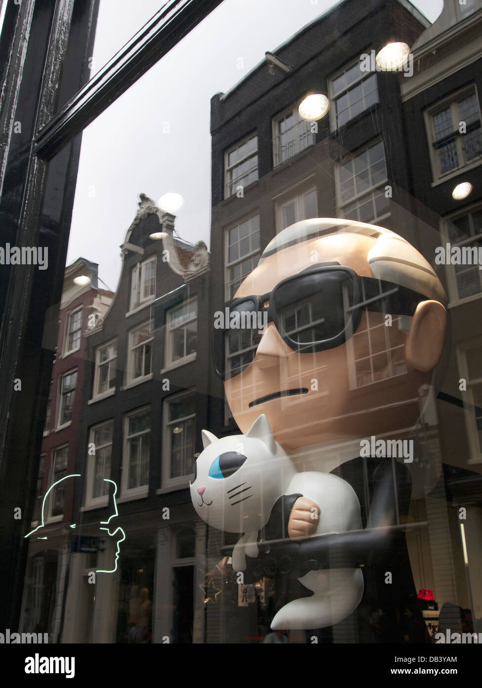 Cartoon character of Karl Lagerfeld in his shop in the city of Amsterdam, the Netherlands Stock Photo