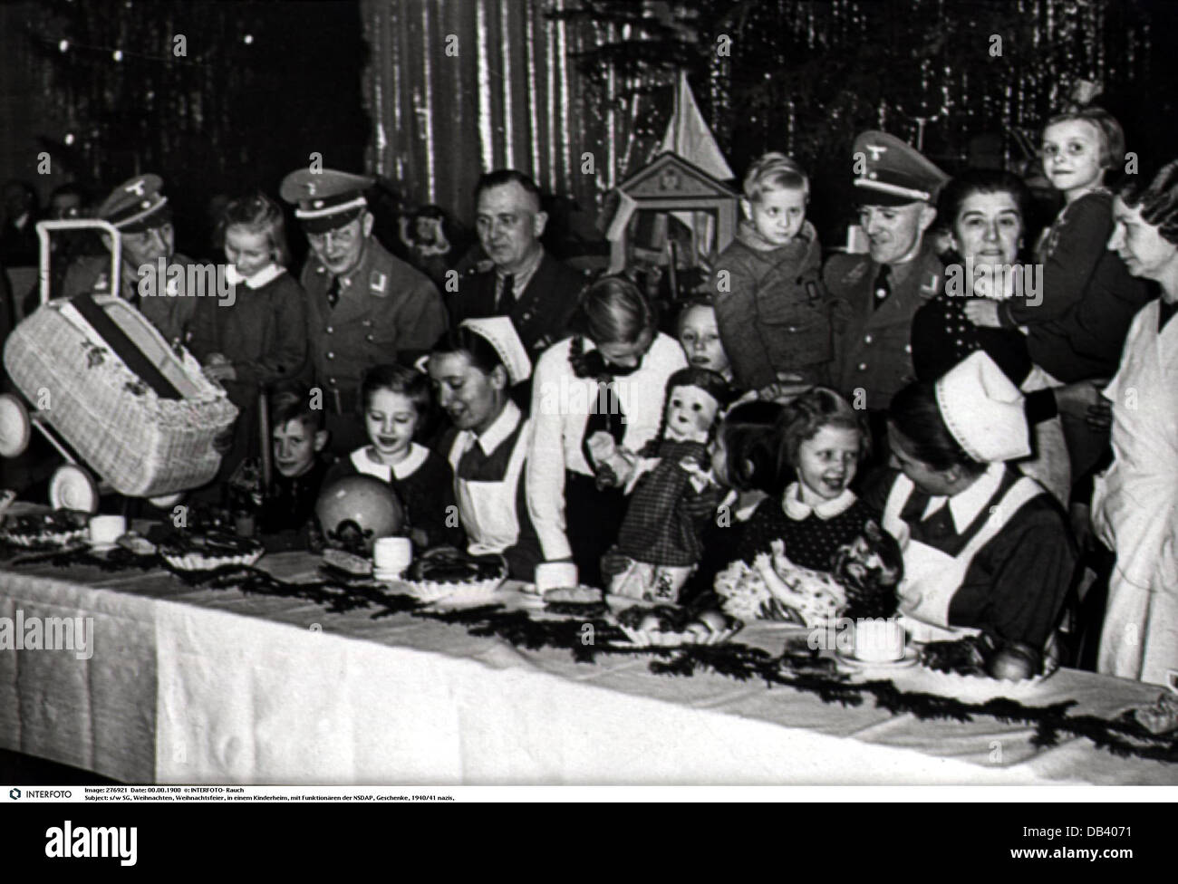 Christmas, gift giving in a children's home with Red Cross nurses and Nazi officials, 1940/1941, Additional-Rights-Clearences-Not Available Stock Photo