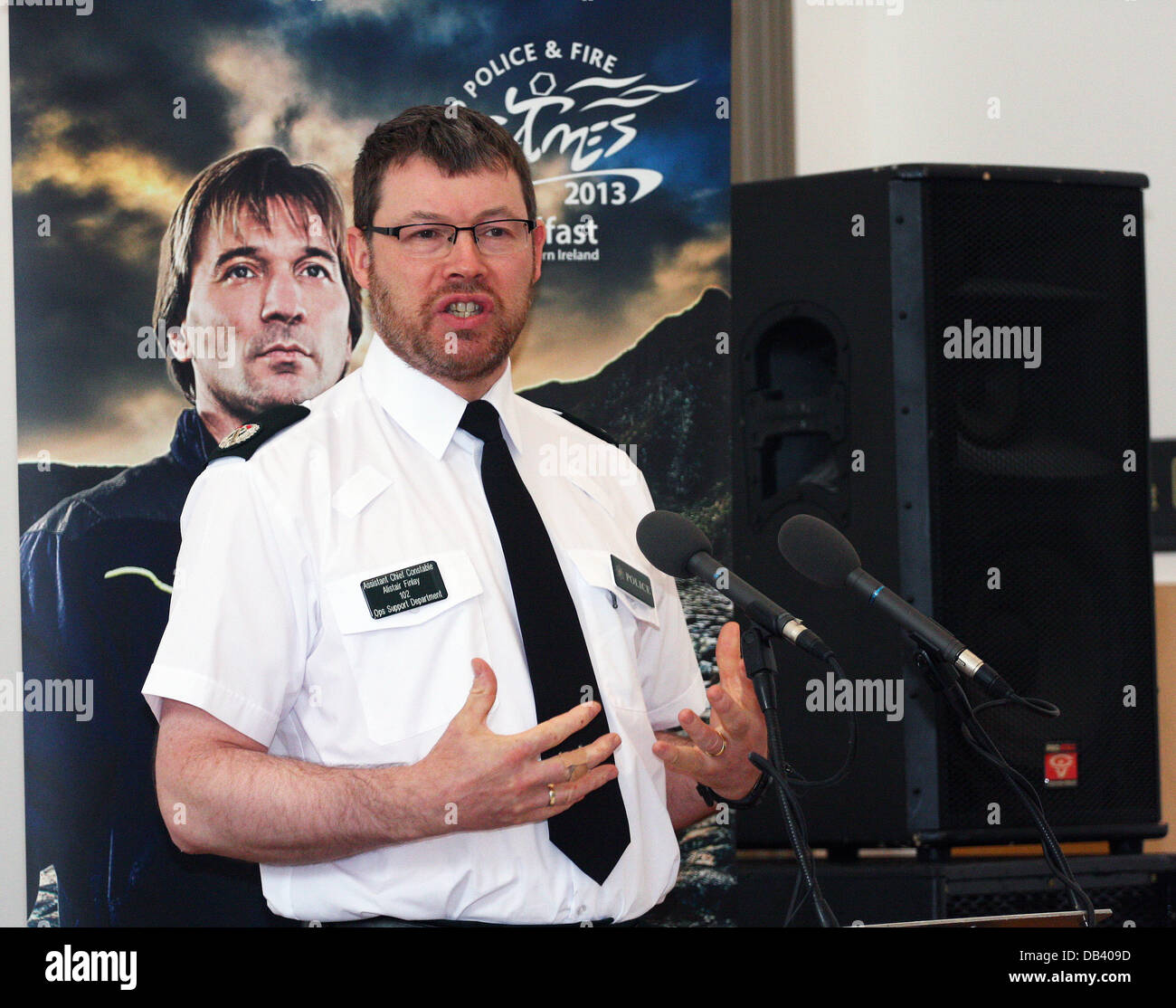 Belfast, Northern Ireland, UK. 23rd July 2013. World Police and Fire Games press conference in the Ulster Hall  Belfast - Assistant Chief Constable Alistair Finlay addresses the press Credit:  Kevin Scott/Alamy Live News Stock Photo