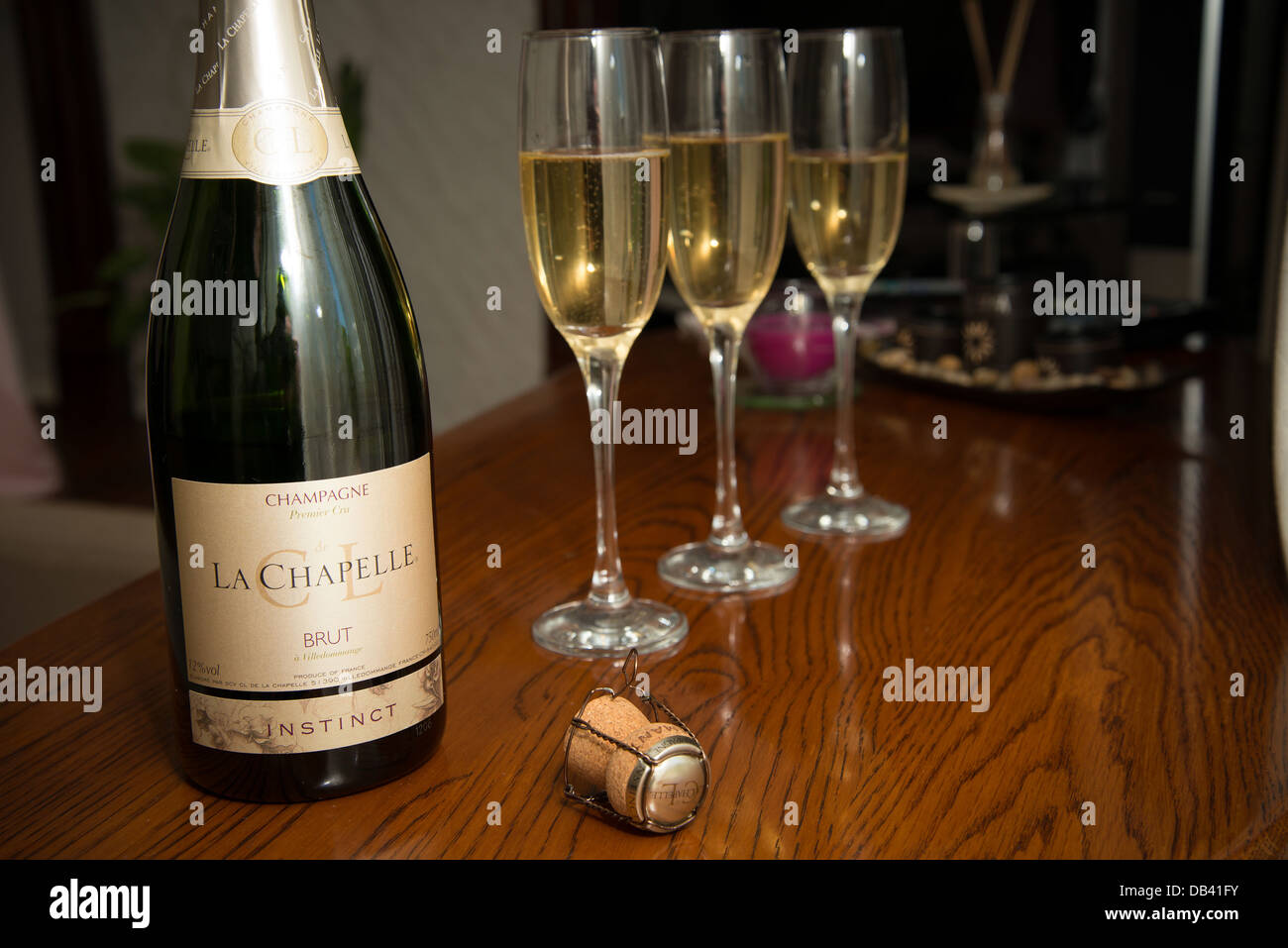 Champagne and glasses on the table Stock Photo Alamy