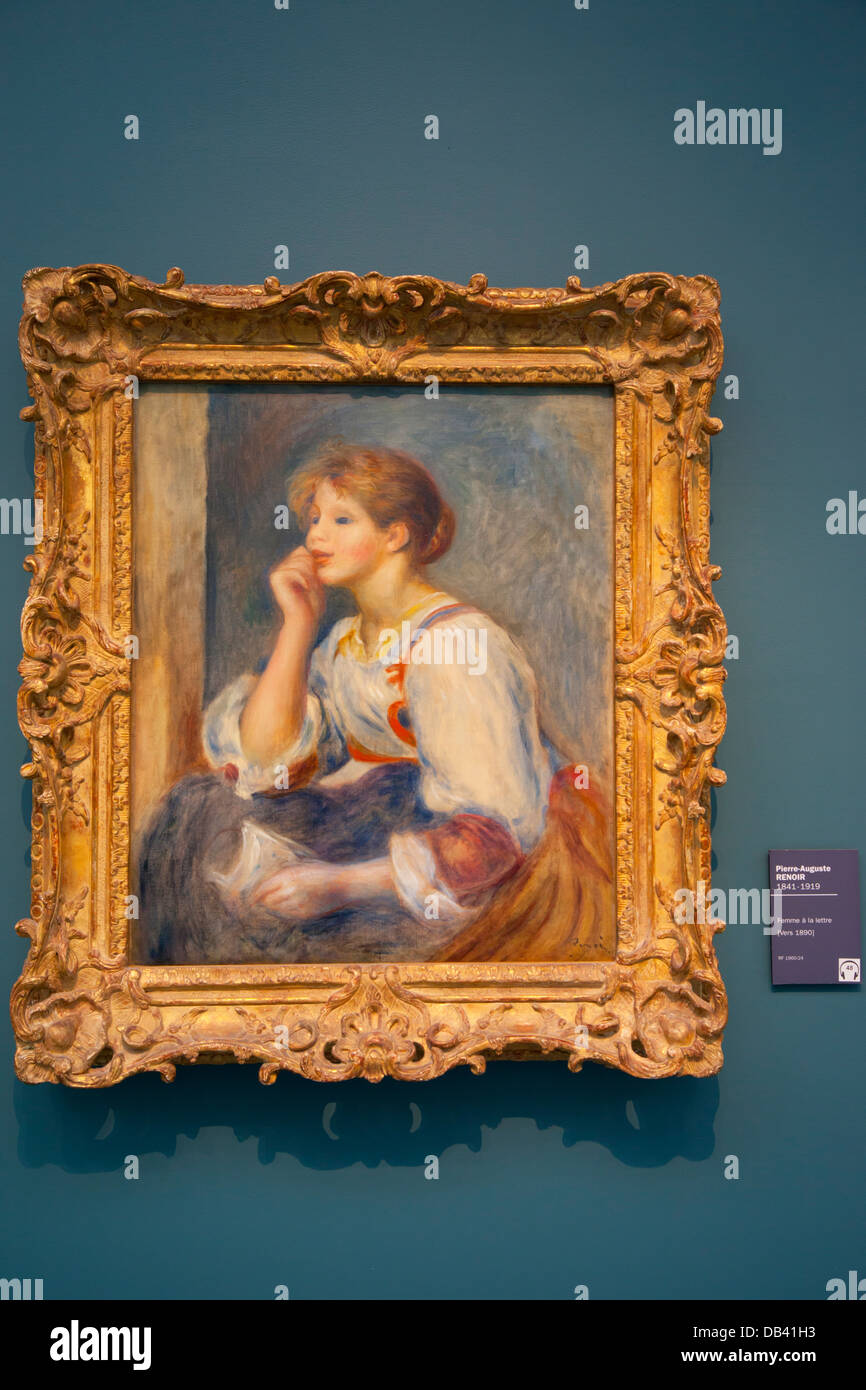 Renoir's painting 'Femme al la Lettre' on display at Musee l'Orangerie, Paris France Stock Photo