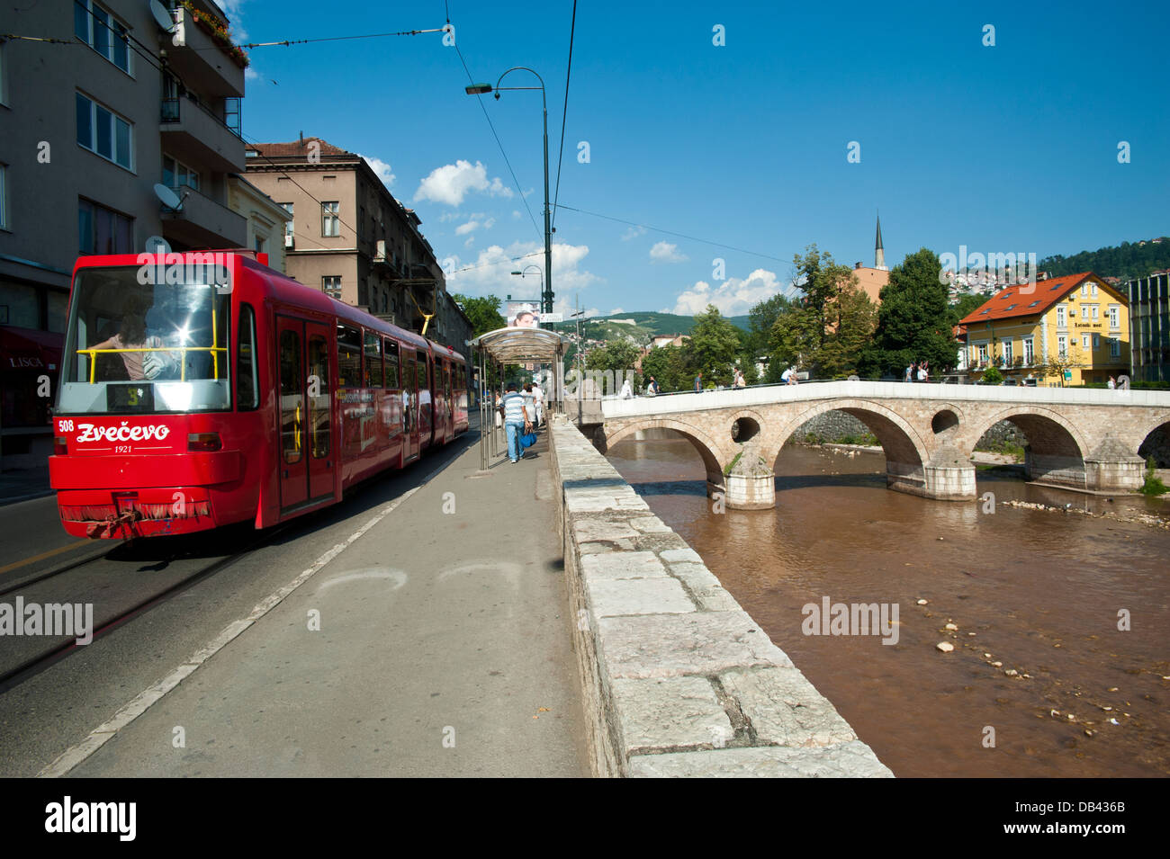 Tram along Miljacka river and Latin Bridge. Sarajevo.Bosnia- Herzegovina. Balkans. Europe. Stock Photo