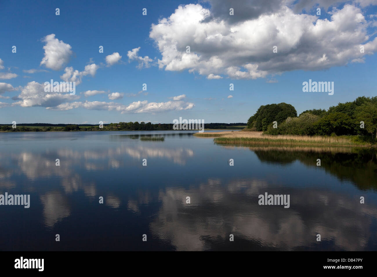 clouds-on-a-summerday-mirrors-on-the-water-at-haraldsted-s-haraldsted