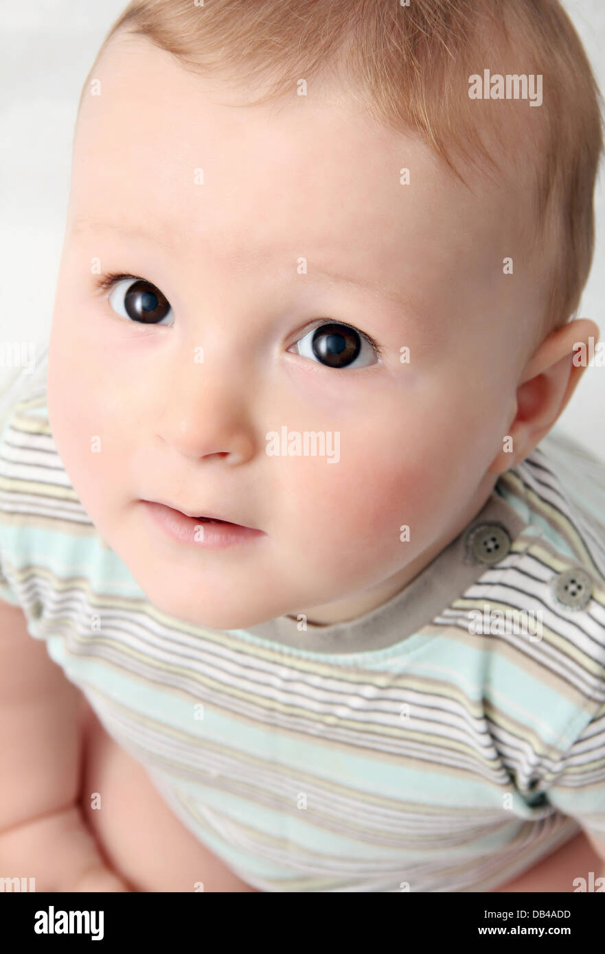 beautiful baby looking up Stock Photo