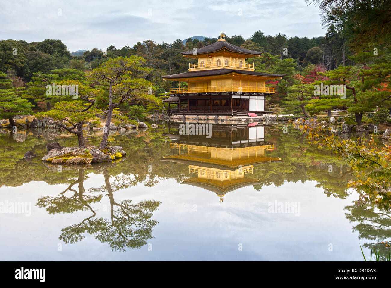 The Golden Pavilion of the temple of Kinkaku-ji or Rokuon-ji in Kyoto, seen in autumn. This Zen Buddhist temple is one of... Stock Photo